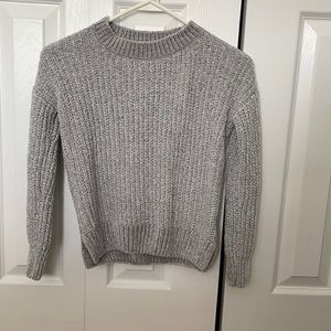 Very soft knit sweater with detail on the back